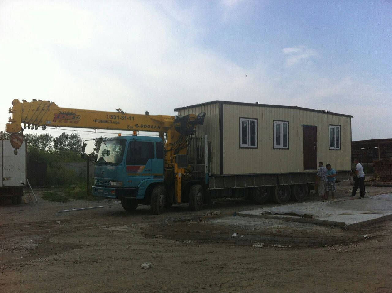 Перевозка негабаритных строительных бытовок в городе Колывань